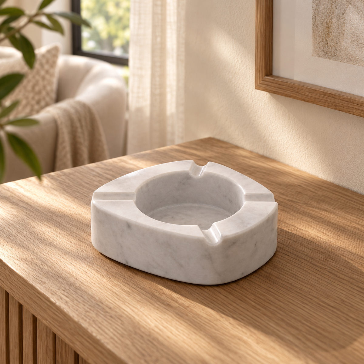ZenPebble Stone Ashtray in Italian Carrara Marble in warm natural home light, one complete product