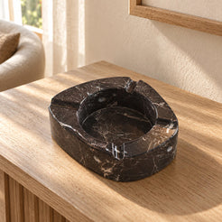 ZenPebble Stone Ashtray in Spanish Emperador Marble in warm natural home light, one complete product