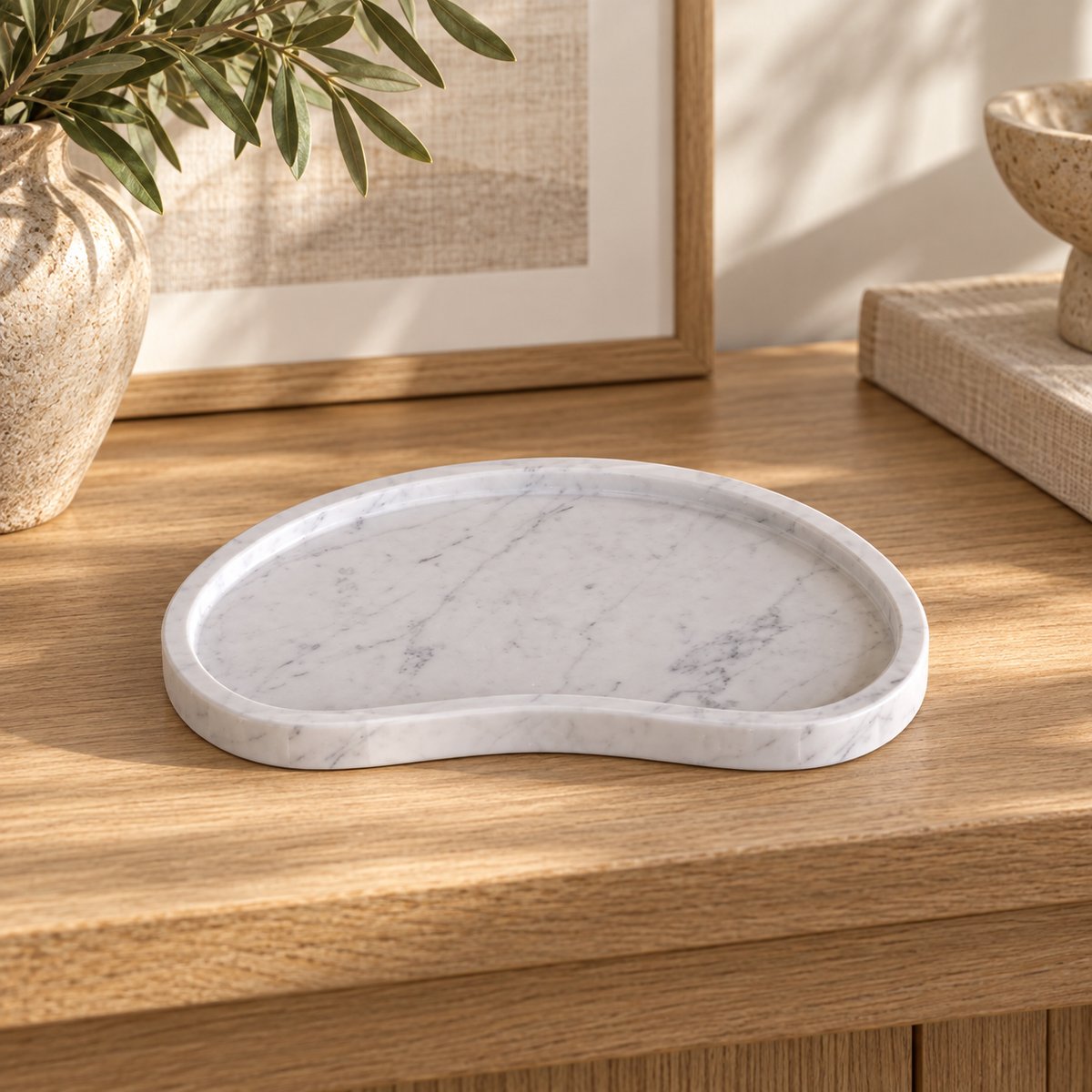 PeaPod Decorative Tray, low frontal concave-edge Hero, warm natural light in a premium home interior
