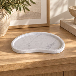 PeaPod Decorative Tray, low frontal concave-edge Hero, warm natural light in a premium home interior