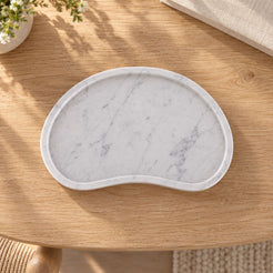PeaPod Decorative Tray, direct overhead true kidney plan, warm natural light in a premium home interior