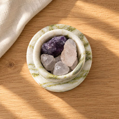 GreenAura Stone Aroma Diffuser, overhead GreenAura cup and assembly, warm natural light in a premium home interior