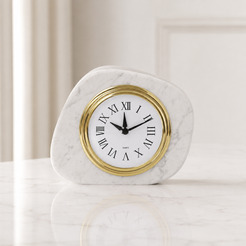 Carrara white marble clock in front view with gold bezel and Roman numeral dial