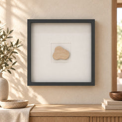 CloudDream wall frame decor, Italian Classico Travertine, frontal view in a warm natural-light interior