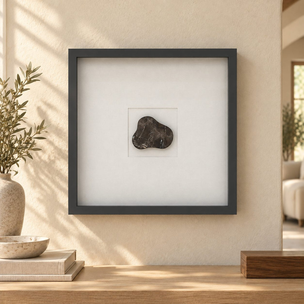 CloudDream wall frame decor, Spanish Emperador Marble, frontal view in a warm natural-light interior