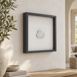 CloudDream Carrara marble wall frame decor, left oblique view in a warm natural-light interior