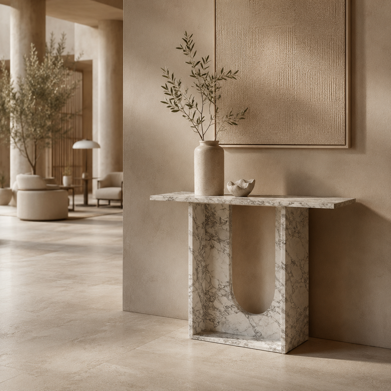 Sculptural stone console table by OIXDESIGN in a refined hospitality or project interior