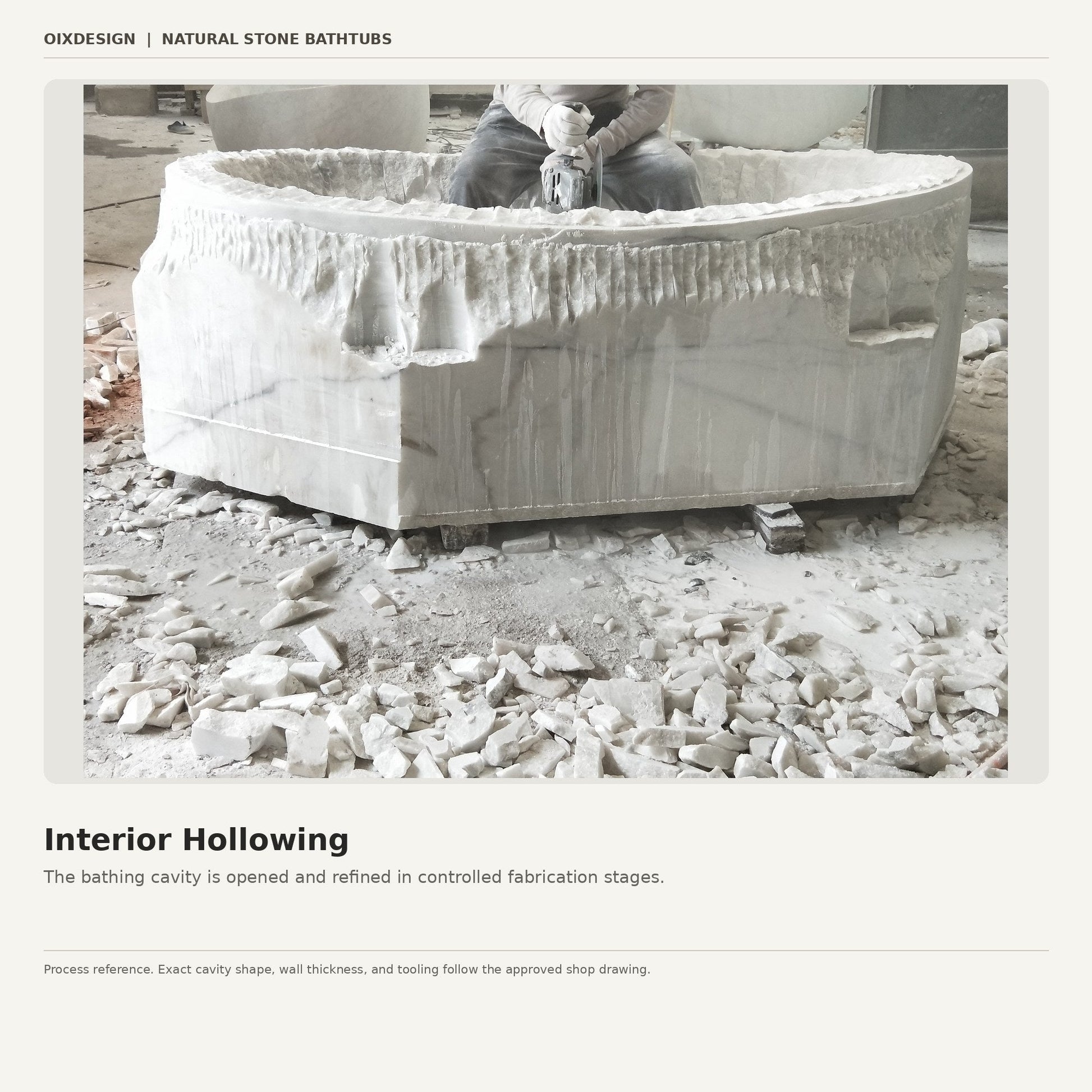 Natural stone bathtub interior being hollowed and shaped in the workshop