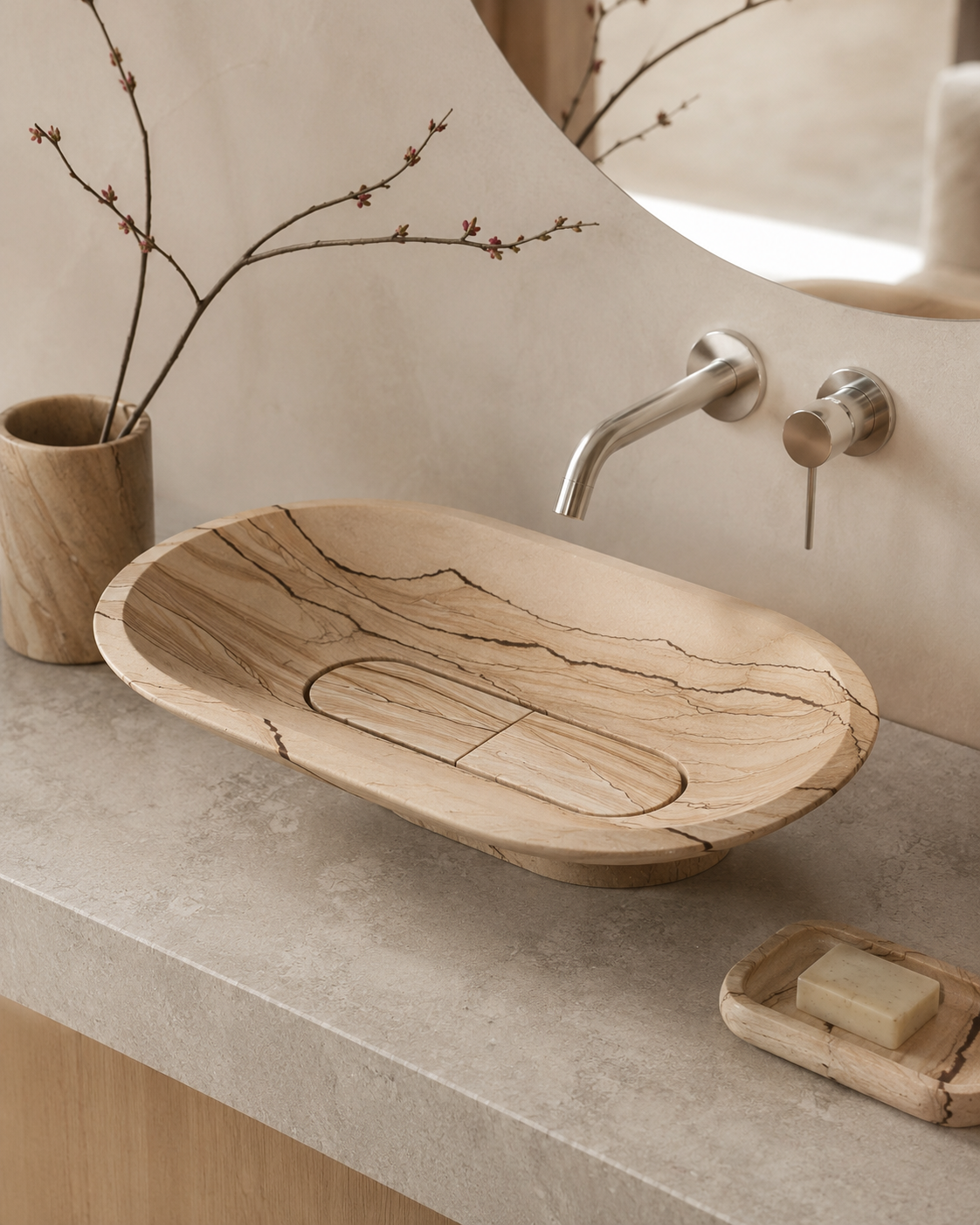 Warm beige natural stone vanity with a sandstone vessel sink, and soap accessories, representing sandstone care.
