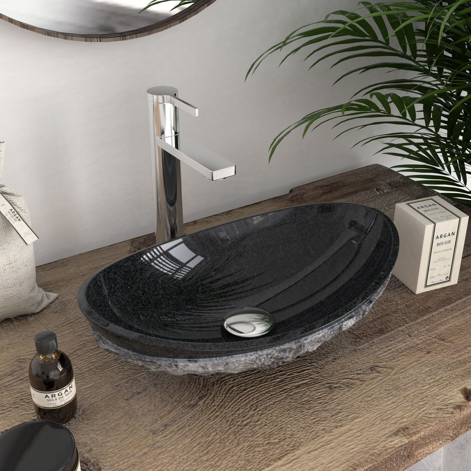 Angled close view of the Soraya oval stone sink showing its dark polished basin and drain