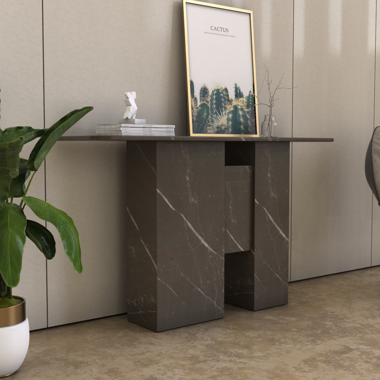 Angled view of the Thalia marble console table showing its long tabletop and carved stone legs