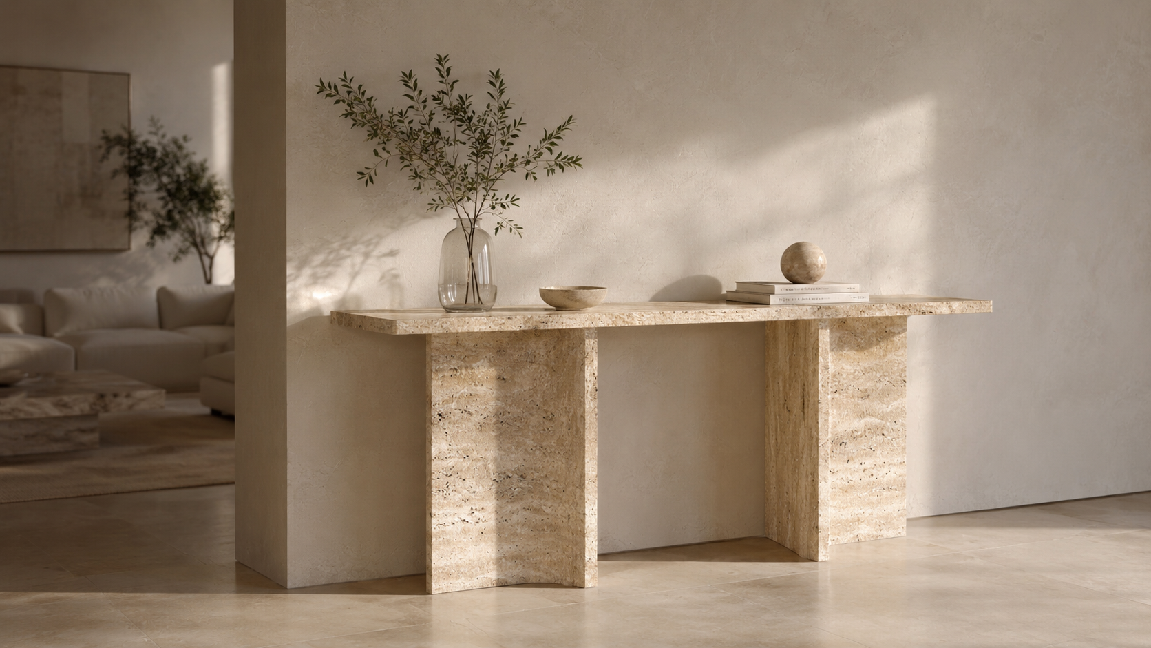 Travertine console table by OIXDESIGN styled in a warm minimalist interior