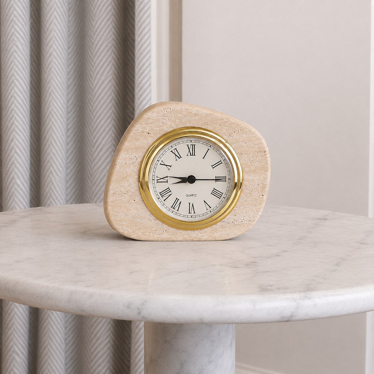 Natural travertine clock in warm minimalist decor with gold Roman numeral dial