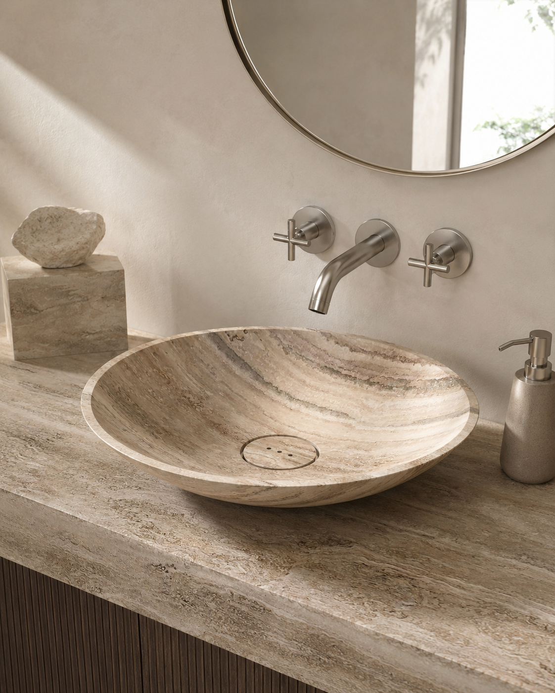 OIXDESIGN natural stone vessel sink displayed in a minimalist bathroom setting, highlighting sculptural form and refined bath design.
