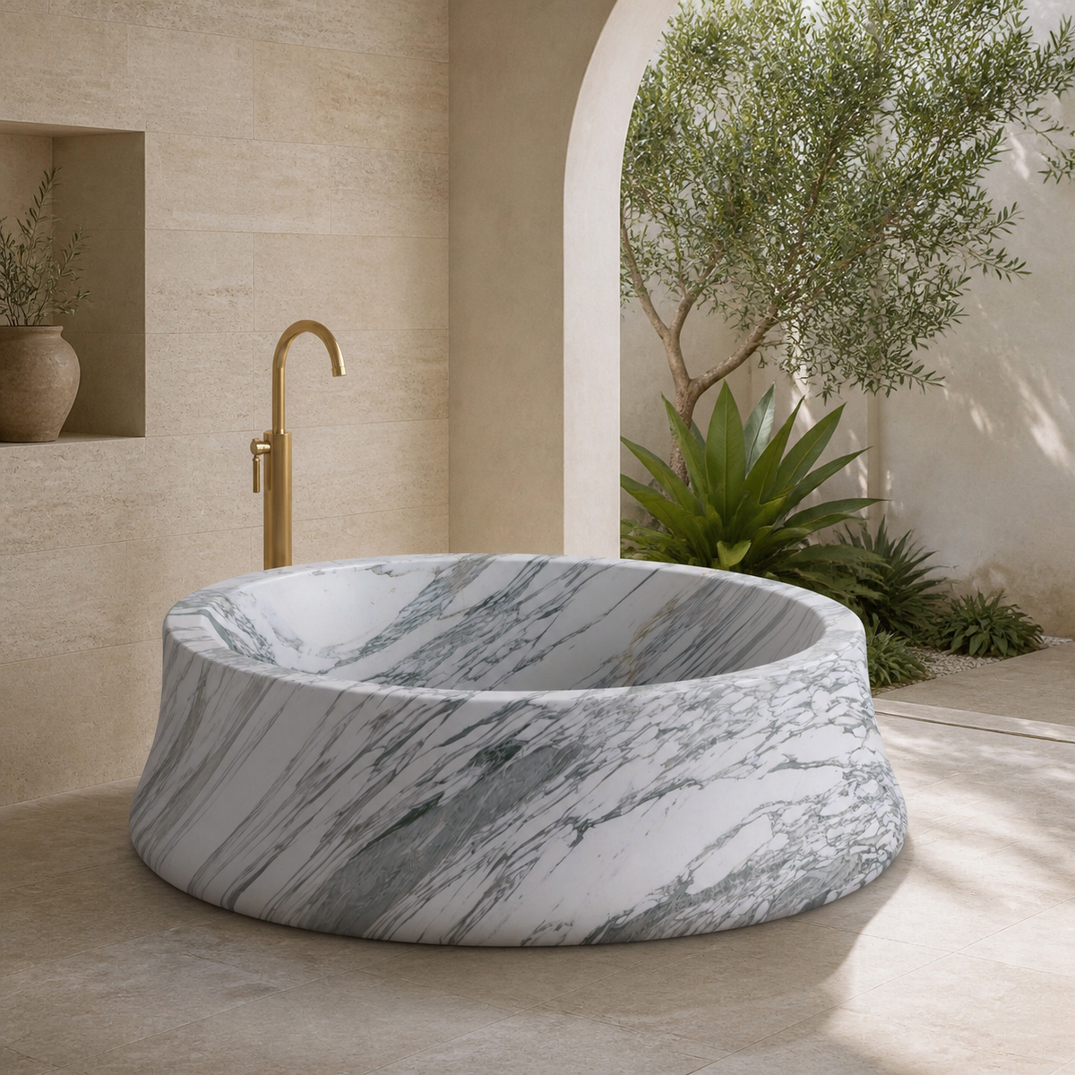 Orlena Sculptural Flared Round Freestanding Soaking Bathtub – Italian Arabescato Marble in a bright serene courtyard spa bathroom; exact product geometry and material preserved