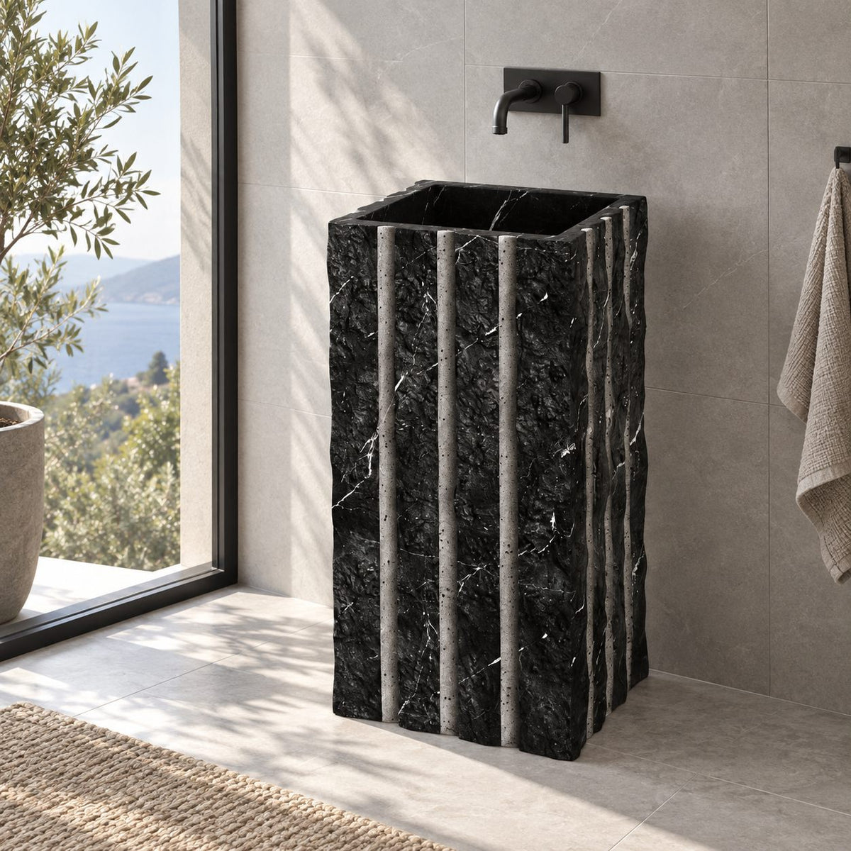 Pablo Portoro Black Marble Pedestal Sink — window-side bathroom view of the complete textured pedestal