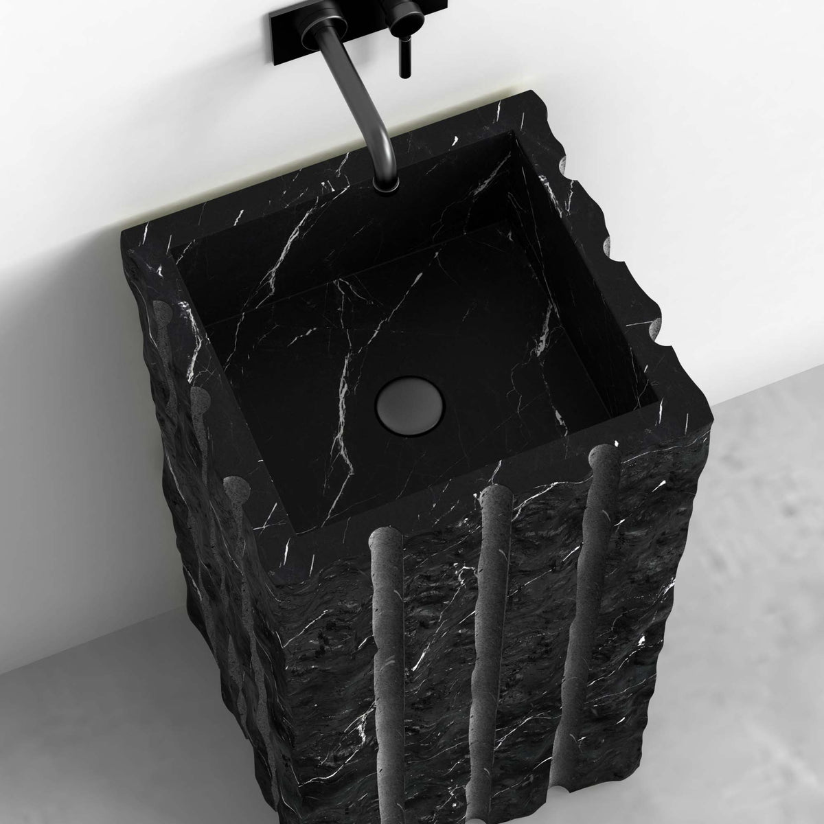 Pablo Portoro Black Marble Pedestal Sink — original elevated view of the rectangular basin and vertical exterior details