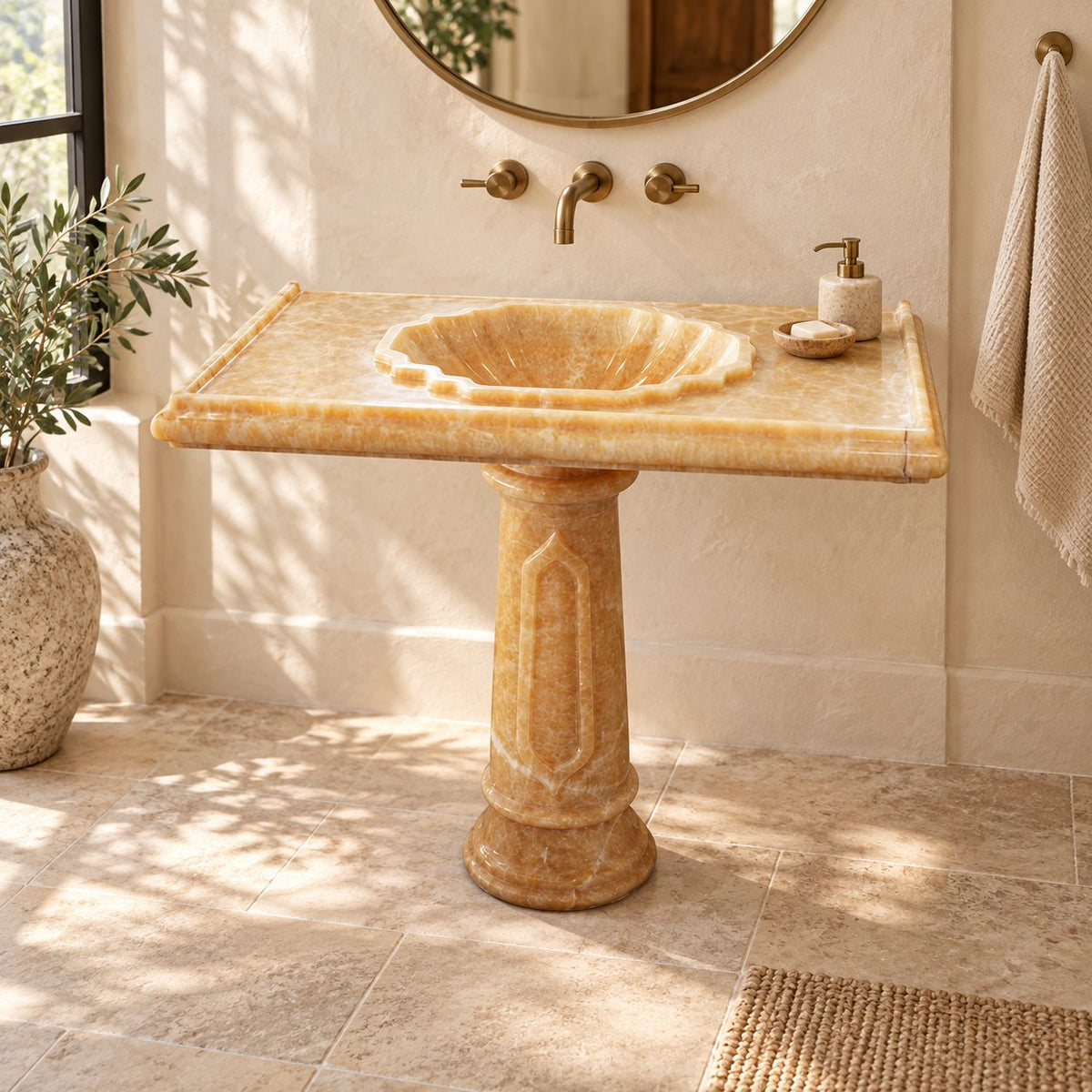 Paddy Honey Onyx Pedestal Sink — complete pedestal sink in a warm plaster bathroom