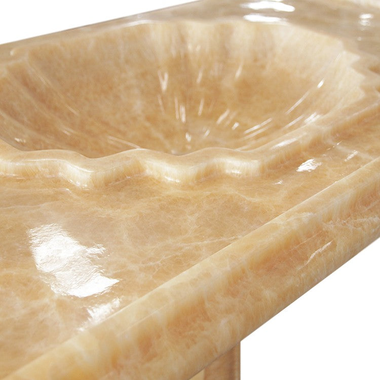 Paddy Honey Onyx Pedestal Sink — original close view of the scalloped basin and honey-gold stone