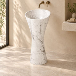 Pahara Carrara White Marble Pedestal Sink — complete pedestal sink in a warm plaster bathroom