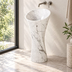 Pahara Carrara White Marble Pedestal Sink — daylight setting showing the complete pedestal form