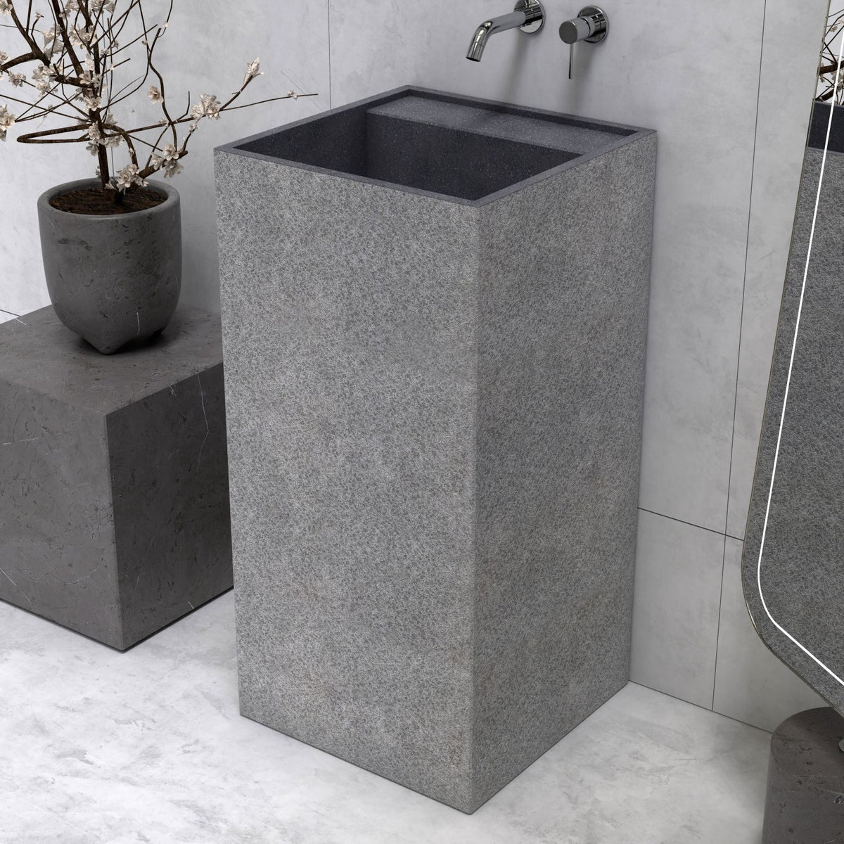 Patala Neroco Granite Pedestal Sink — complete pedestal sink from basin rim to floor base in a bathroom