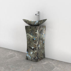 Payal Celestia Blue Quartzite Pedestal Sink — complete oval basin and rectangular pedestal from rim to floor in a bathroom corner
