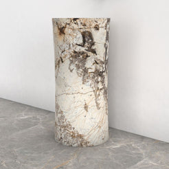 Pazia Pandora Blanc Quartzite Pedestal Sink — complete pedestal sink from basin rim to floor in a bathroom corner