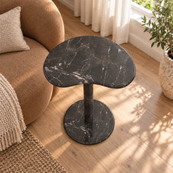 PeaPod Dark Emperador marble side table in a window reading nook, shown from above