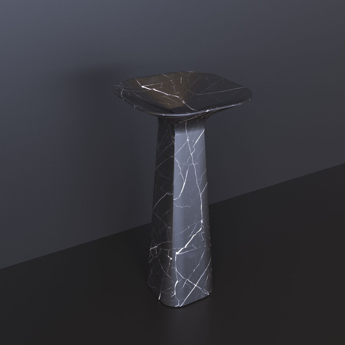 Polona Portoro Black Marble Pedestal Sink — original view of the shallow basin and tapered faceted pedestal