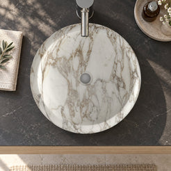 Illustrative overhead bathroom vanity setting showing the Sabino Terista marble basin and central drain