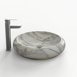 Side angled view of the Sabino Terista marble bowl and slim gold-coloured base