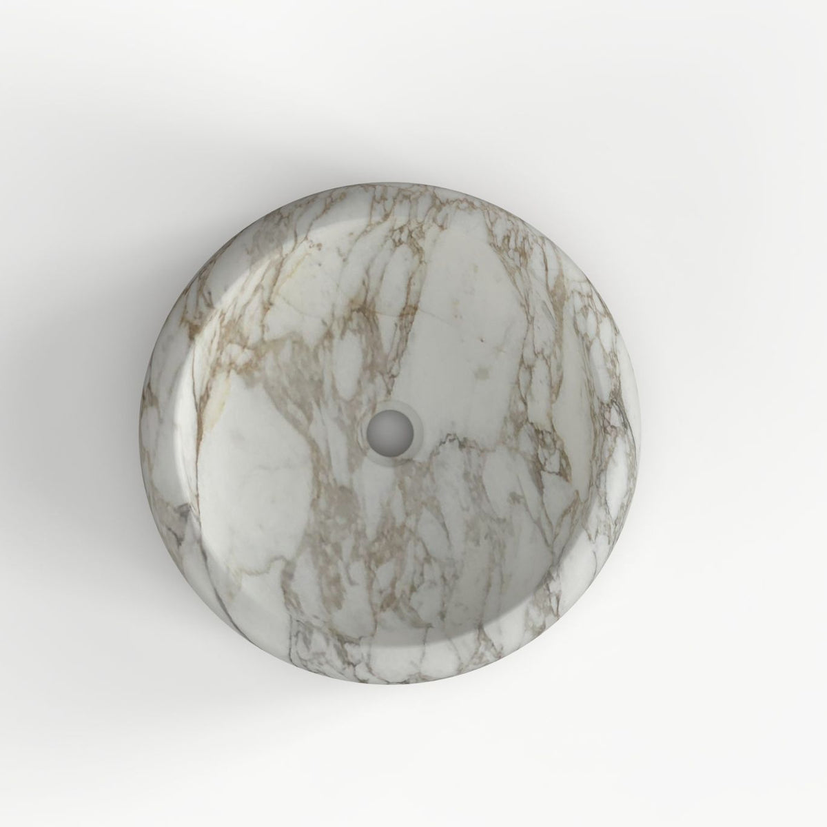 Overhead view of the Sabino Terista marble basin and central drain opening