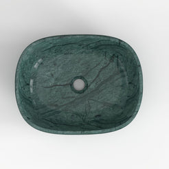 Sabiya overhead view of green stone markings and central drain