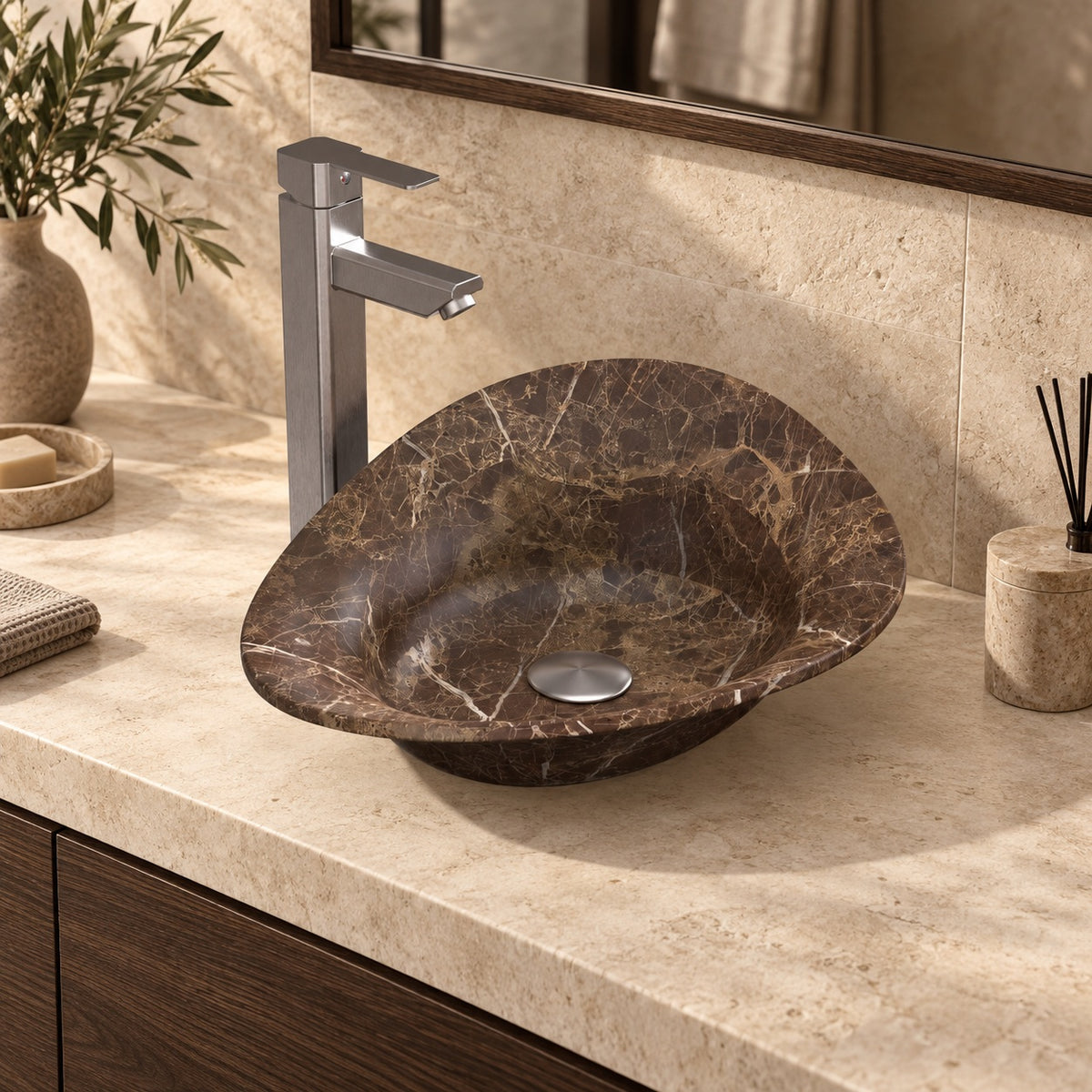 Sabria Marocca brown marble bowl with flared rim on a pale stone vanity