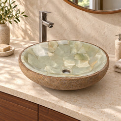 Illustrative three-quarter bathroom lifestyle of Saccus with pale jade mosaic interior and brown cobble stone exterior