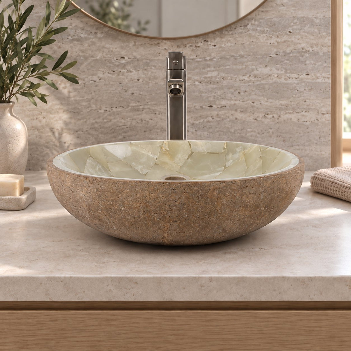 Illustrative low-side bathroom lifestyle of Saccus with pale jade mosaic interior and brown cobble stone exterior