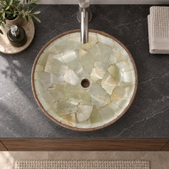 Illustrative overhead bathroom lifestyle of Saccus with pale jade mosaic interior and brown cobble stone exterior