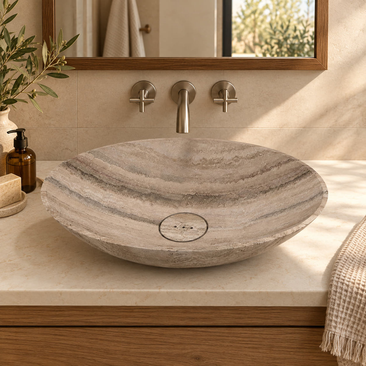 Sadiki Travertino Argento oval vessel sink in a warm cream and oak bathroom
