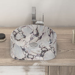Safira front view of the curved marble bowl on the vanity