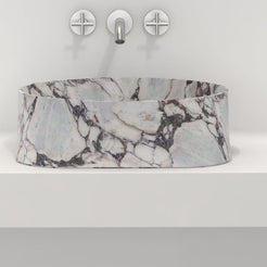 Safira front profile of the rounded triangular marble basin
