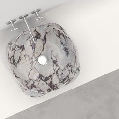 Safira interior and branching marble veins on a white counter