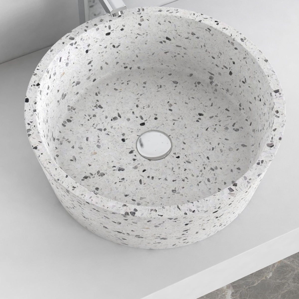 Sauri high oblique view of the round terrazzo bowl and counter