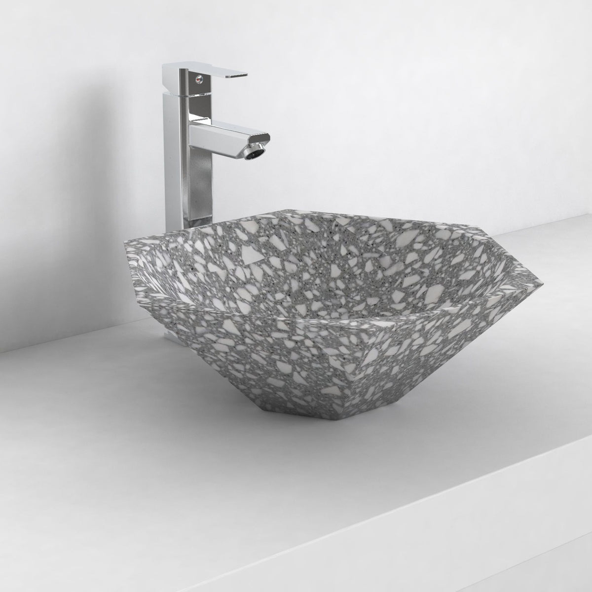 Scarlet classic terrazzo vessel sink, faceted angular bowl, on a countertop from a second angle