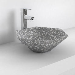 Scarlet classic terrazzo vessel sink, faceted angular bowl, on a countertop from a second angle