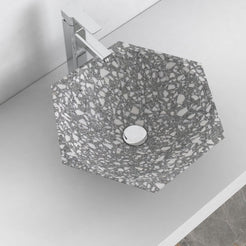 Scarlet classic terrazzo vessel sink, faceted angular bowl, in an overhead or alternate countertop setting
