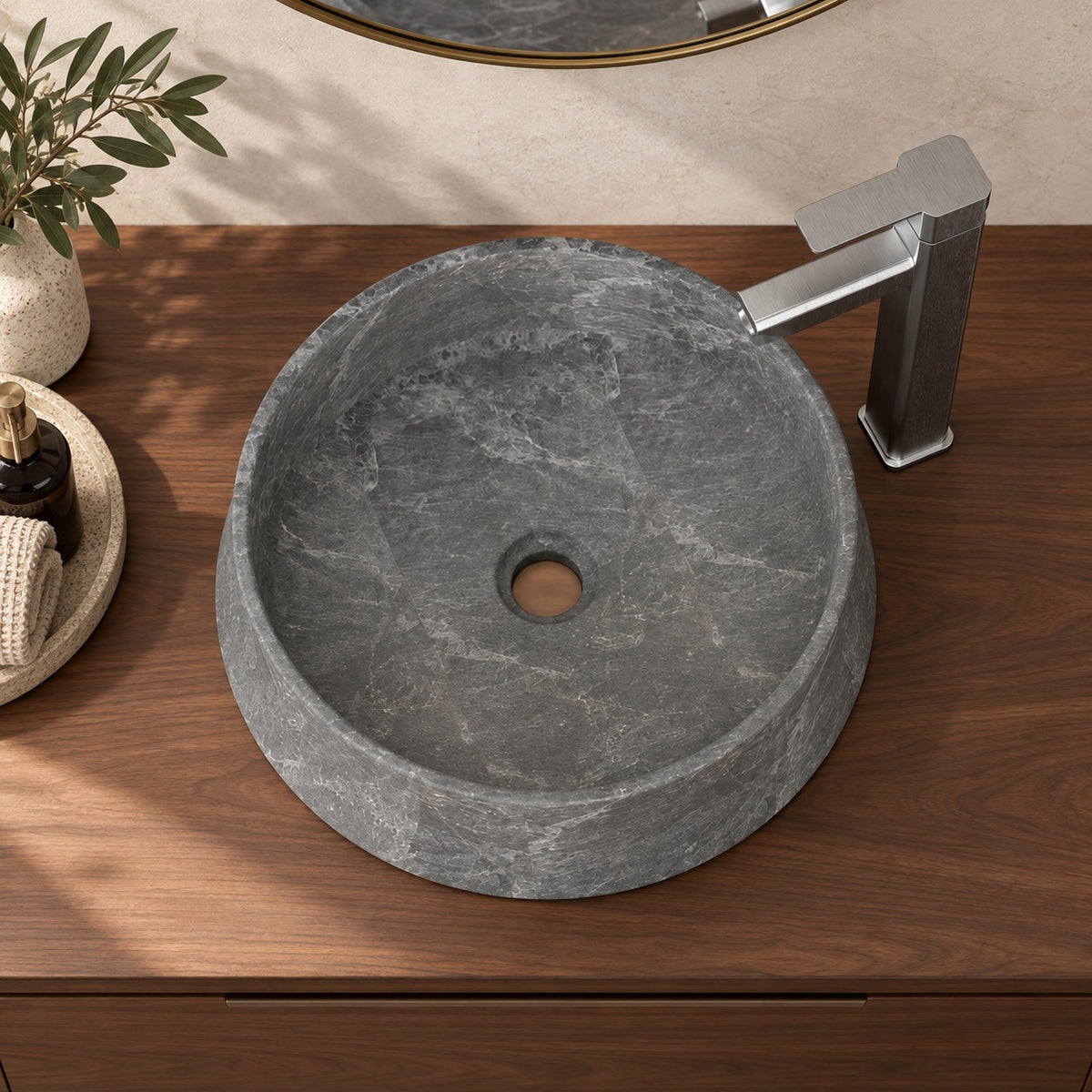 Seana Terista marble vessel sink, round bowl, in an overhead or alternate countertop setting