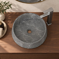 Seana Terista marble vessel sink, round bowl, in an overhead or alternate countertop setting