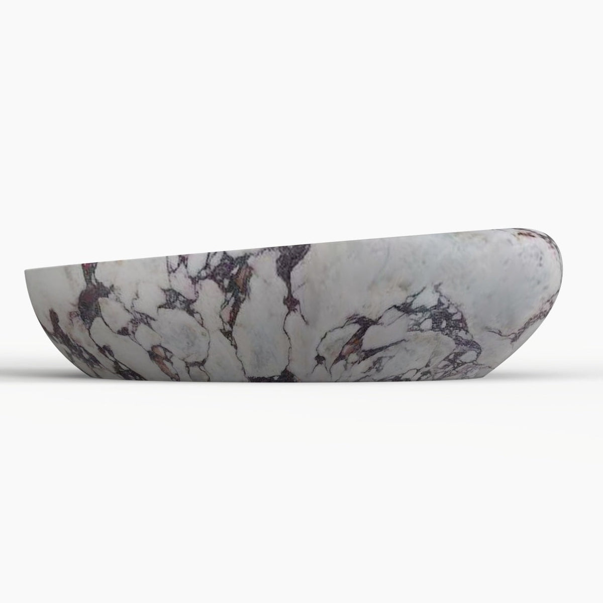 Selema Calacatta marble vessel sink, asymmetric oval bowl, showing the complete exterior profile
