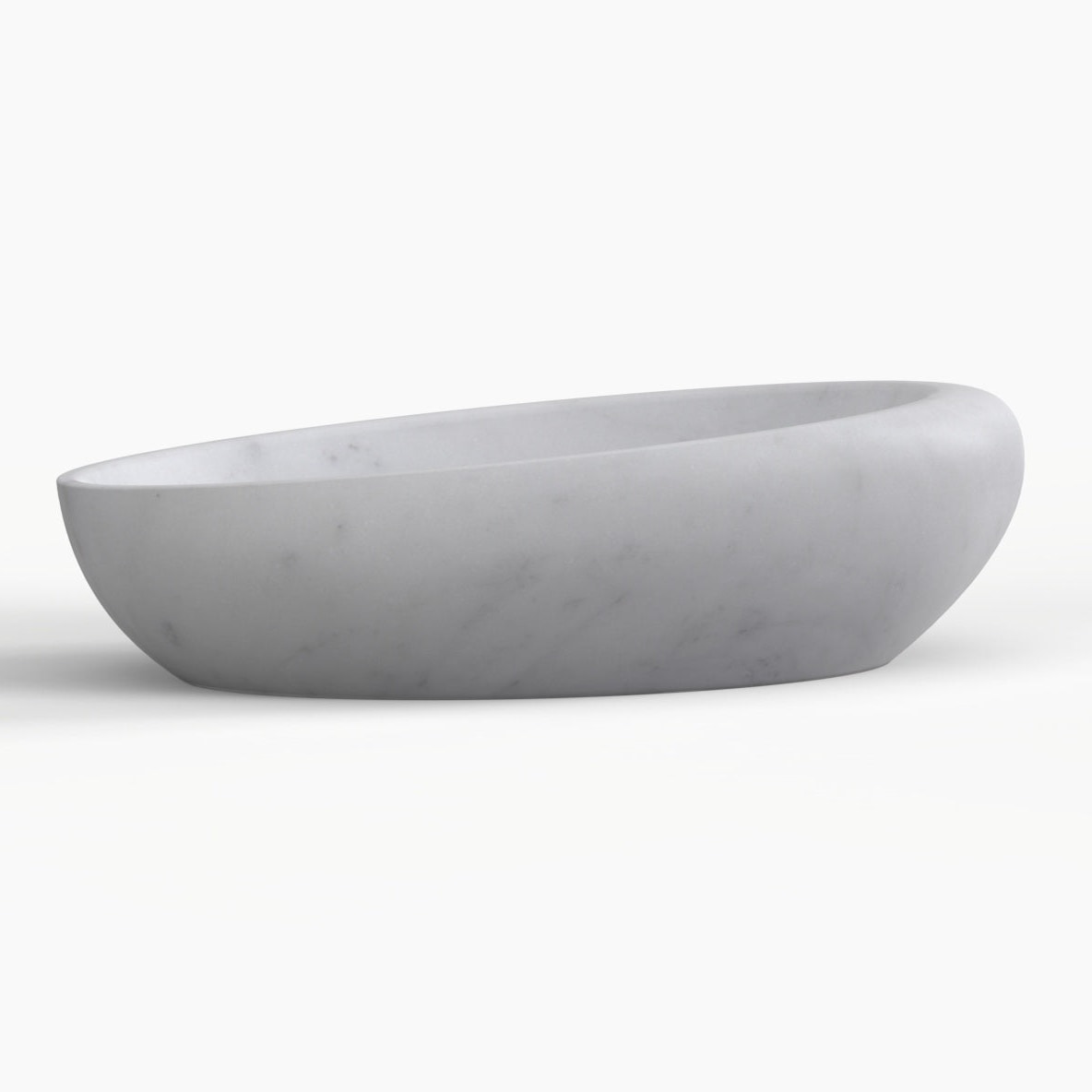 Selema Carrara marble vessel sink, asymmetric oval bowl, showing the complete exterior profile